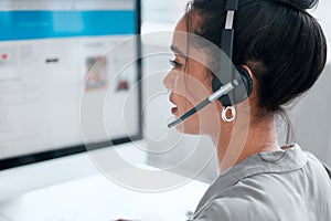 Call center, computer and profile of woman consultant in office for online crm consultation or enquiries. Telemarketing