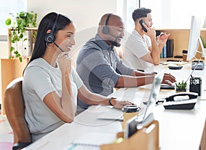 Call center, customer service or support with consultant people at work in an office for assistance. Contact us, crm or