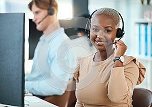 Call center, customer service and support consultant working in a busy office, friendly help with happy woman. Portrait