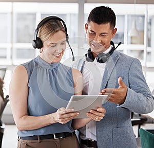 Call center, customer service and team of consultants on a tablet in the office planning a crm strategy. Telemarketing