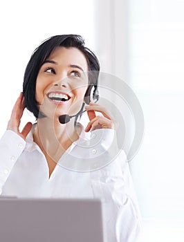 Call center, customer support and happy woman doing online consultation in the office. Contact us, smile and female