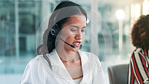 Call center, customer support and woman in office talking for consulting, help and CRM service. Telemarketing