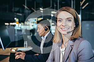 Call center employee provide help to client distantly. Asian male customer services agent with headset working in online store