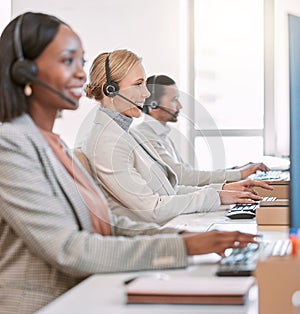 Call center, employees and keyboard for team, smile and friendly for customer service, headset and tech support. Office
