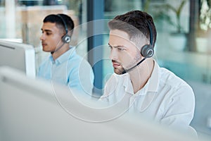 Call center, focused businessman and helping with customer service advice online. Operator, telemarketing and consultant