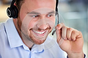 Call center, happy and man on mic for listening, support or customer service for business. Face, telemarketing and smile