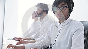 Call Center Operator. Beautiful Black Woman In Headset Working