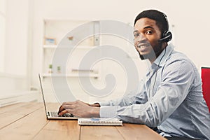 Call center operator man with headset working