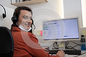 call center operator in medical mask