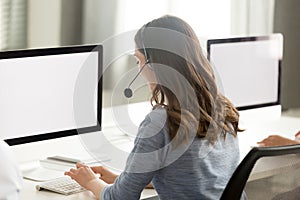 Call center operator using computer, looking at screen mock up