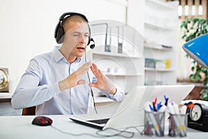 Call center operator warns the client via video call about the end of communication session