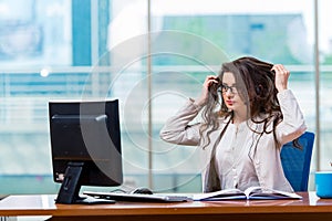 The call center operator working in the office