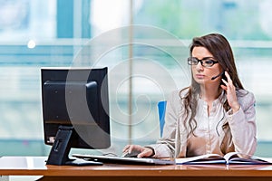 The call center operator working in the office