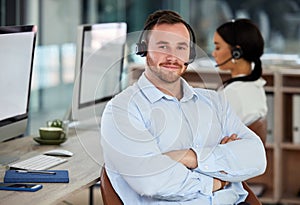 Call center, portrait and confident business man in office for support, help and customer service. Face, telemarketing