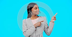 Call center, portrait or happy woman in studio pointing for promotion or product placement on blue background. Smile