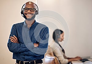 Call center, smile and black man with headset for customer service, crm or telemarketing support. Portrait of african