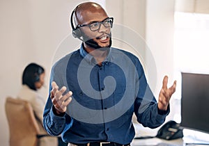 Call center, talking and black man with headset for customer service, crm or telemarketing support. African person