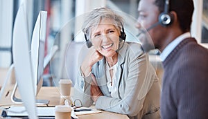 Call center, team talking and laughing woman in office with coworker, funny joke or comedy. Telemarketing, contact us