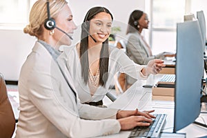 Call center, training and woman at desk with computer, manager and discussion at help desk with advice from leader