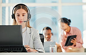 Call center, woman and agent at laptop for telemarketing, customer service or IT support in coworking agency. Sales