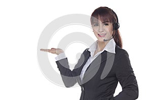 Call center woman with headset Studio shot. Smiling Business woman showing open hand palm isolated on a white background with cop