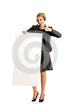 Call center woman holding empty blank