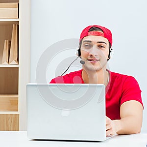 Call center worker at parcel distribution center in post office