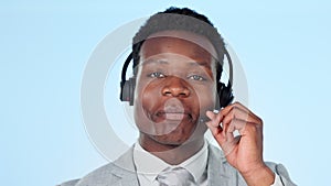 Call centre, smile and headset in studio by man, technical support and customer service. Happy black person, help desk