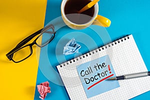 Call the Doctor - note pinned at corkboard. Concept of healthy life 911