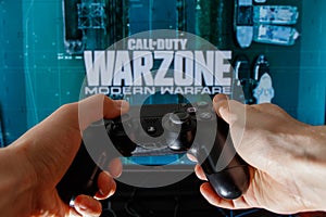 Call of Duty Warzone video game. Playing video game on Playstation 4.