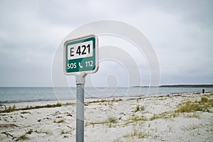 A call for help sign at the beach