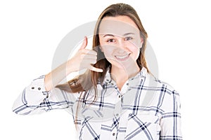 Call me Pretty young woman showing phone sign with her fingers in portrait with white background