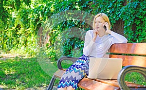 Call sales techniques. Sales manager works in park. Woman with laptop works outdoors. Best sales managers always possess