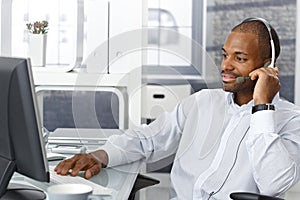 Callcenter agent with headset photo