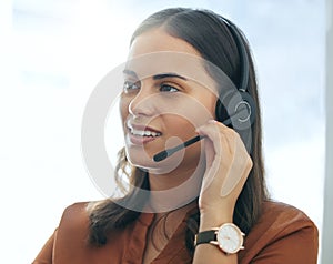 Callcenter, phone call and woman in office consulting for customer service, telemarketing and headset at help desk