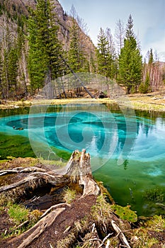 So-called blue geyser lake in Altay mountains photo