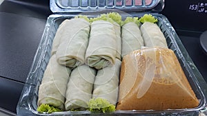 We called lumpia basah containing vegetables and eggs photo