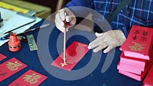 Calligrapher, old man, is writing calligraphy characters, Chinese calligraphy, Lucky word