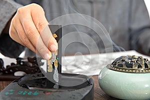 A calligrapher who studies ink with ink strips