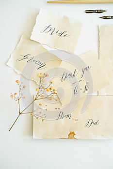 calligraphy invitation cards. lettering on handmade papers