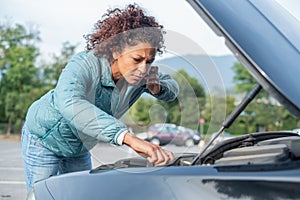 Calling roadside service after car engine breakdown