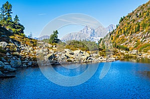 Calm autumn Alps mountain lake with clear transparent water and reflections. Spiegelsee or Mirror Lake, Reiteralm, Steiermark,