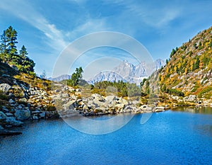 Calm autumn Alps mountain lake with clear transparent water and reflections. Spiegelsee or Mirror Lake, Reiteralm, Steiermark,