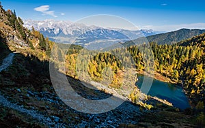 Calm autumn Alps mountain lake with clear transparent water and reflections. Untersee lake, Reiteralm, Steiermark, Austria