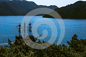 Calm bay with clear water and anchored sailing ships. Marmaris, Turkey