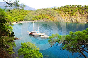 Calm bay with sail boat. Turkey