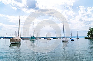 Calm boats on lake Starnberger See Germany photo