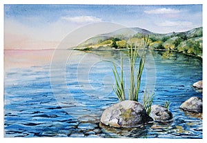 A calm evening landscape with lake and mountains