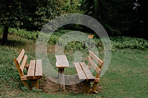 Calm Fall Season in German Park. Beautiful Landscape With Table and Bench In Autumn Forest. Picnic Bench and Table in