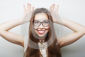 Calm and friendly woman with glasses